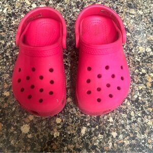 Slightly worn toddler girl crocs